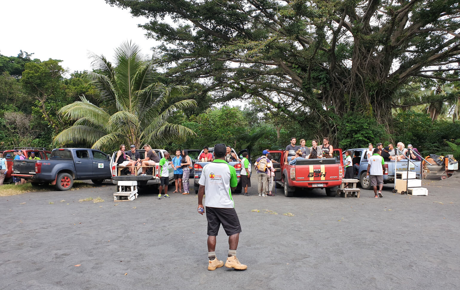 Organising trucks at Mount Yasur.